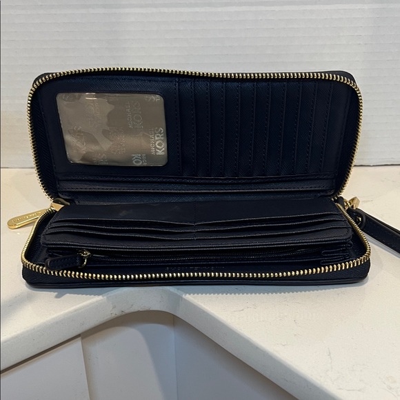 Michael Kors Dark Blue Wristlet with Gold Accents - Picture 2 of 4